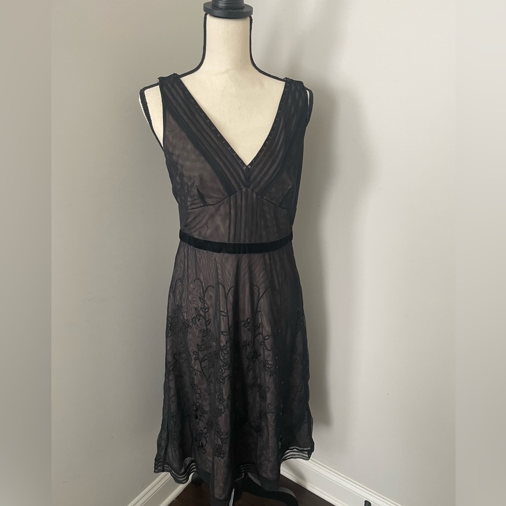 Beautiful black lined Ann Taylor Loft cocktail dress. Size 6. Worn once.
